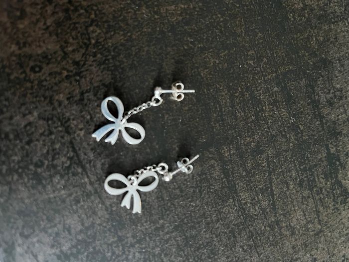 Paire de boucle d’oreilles noeuds