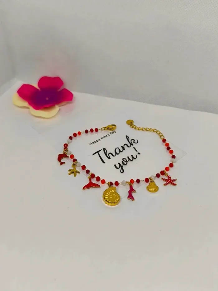 Bracelet doré et rouge avec perles de cristal et breloques de la mer - photo numéro 5