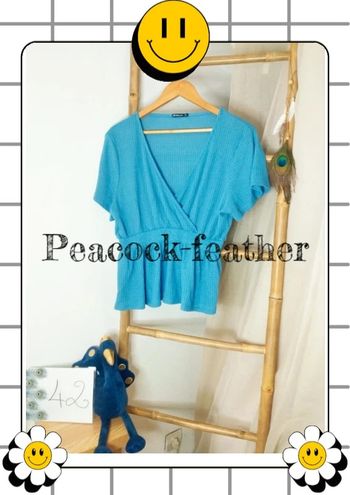 Haut péplum bleue 42 follow me