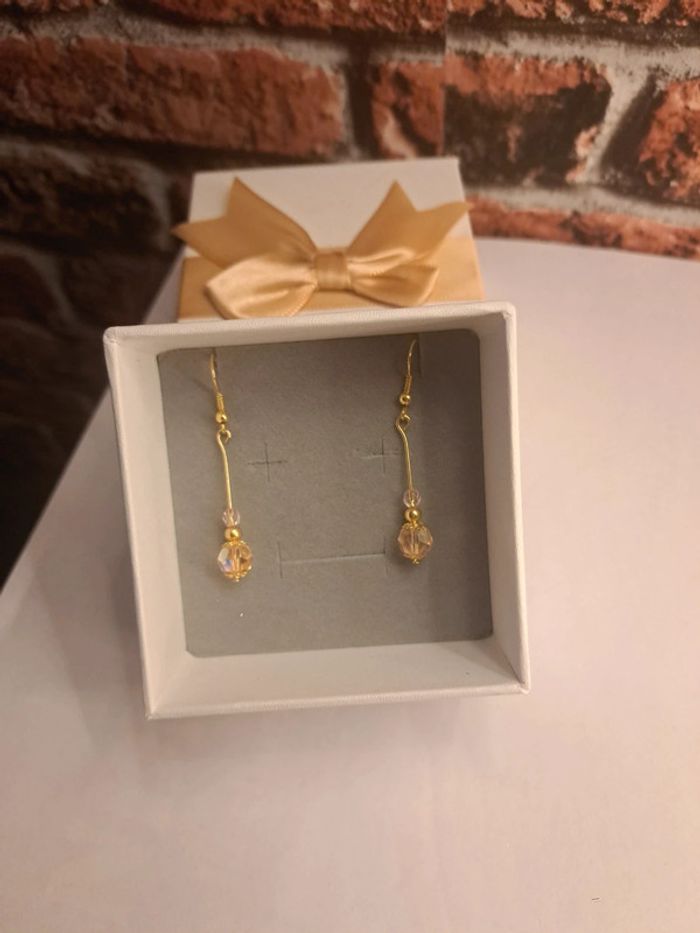 Boucles d'oreilles pendante pêche et doré