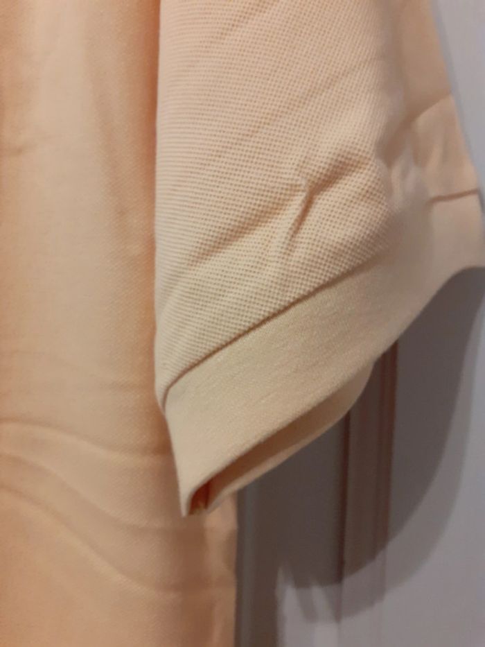 Polo  taille 4 neuf - photo numéro 3