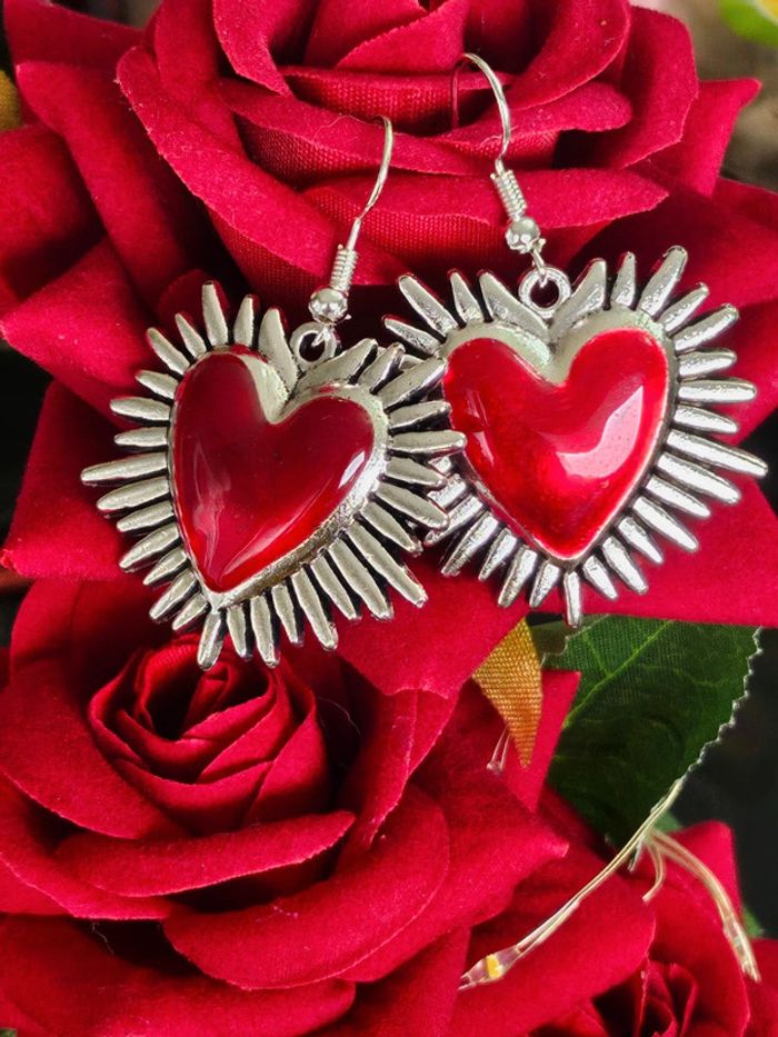 Boucles d oreilles coeur avec rayons en acier inoxydable