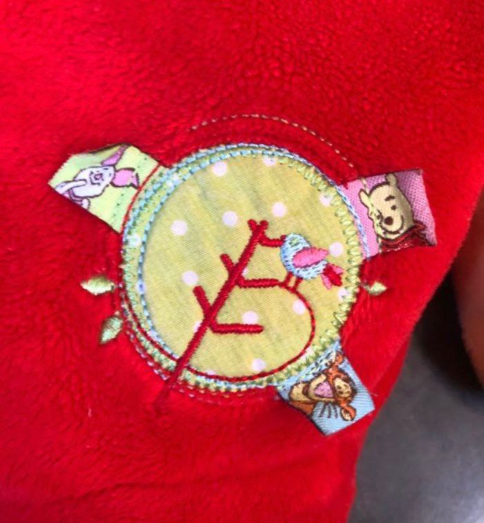 Peluche doudou Range pyjama Winnie 55 cm Disney - photo numéro 2