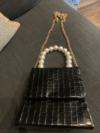 Petit sac noir stylé grosses perles