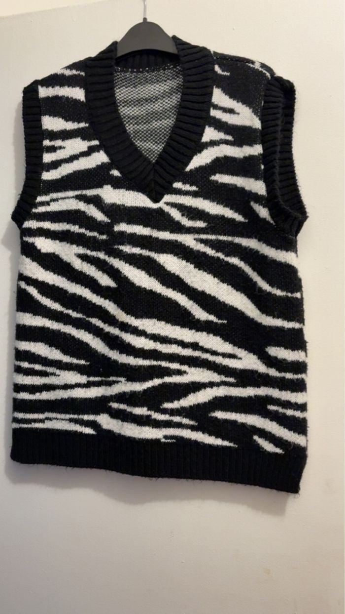 Petit pull sans manche