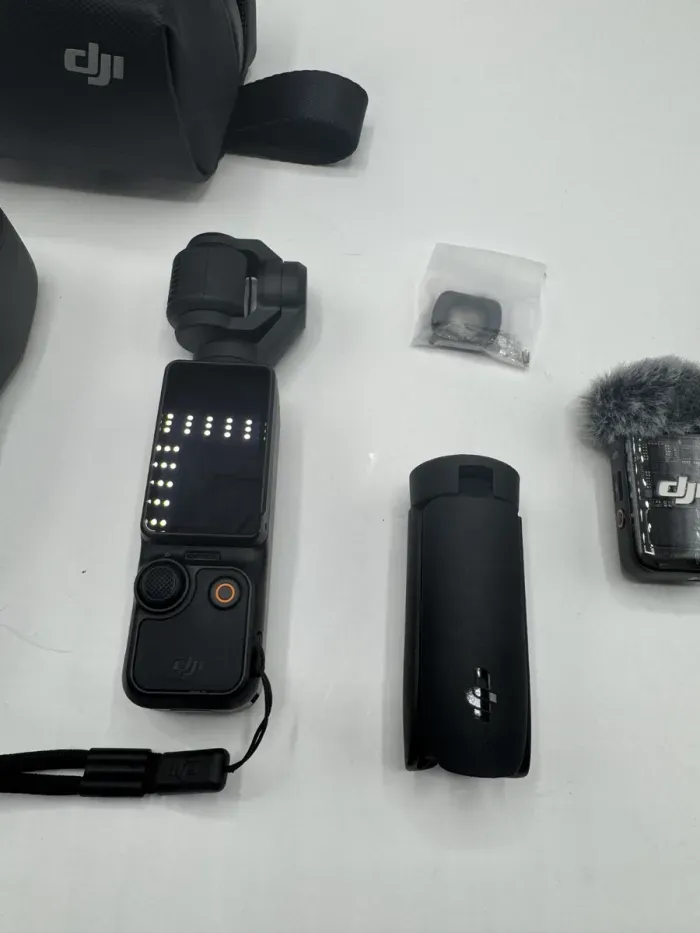 DJI Osmo Pocket Stabilisateur 3 Axes et Caméra Portable 4K Créateur Combo en parfait état - photo numéro 2