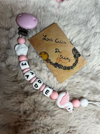 Attache tétine cygne