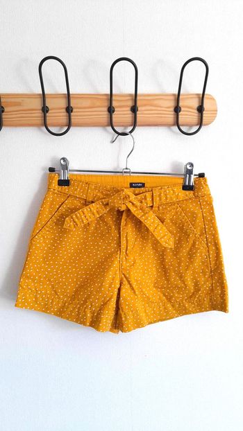 Short jaune à pois blanc Kiabi 9 ans