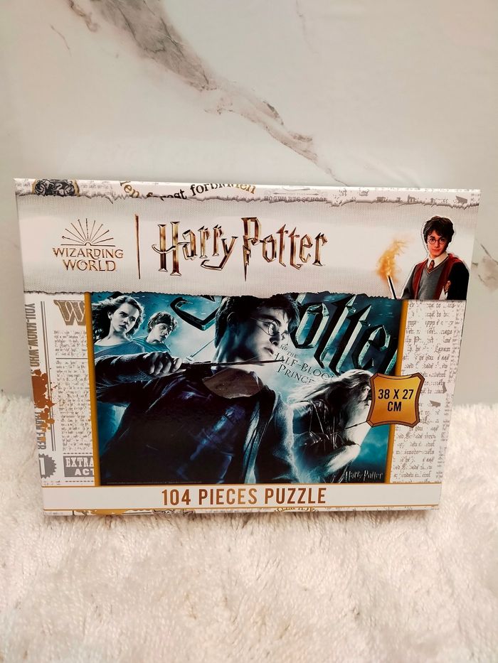 Puzzle Harry Potter 104 pièces 38*27cm