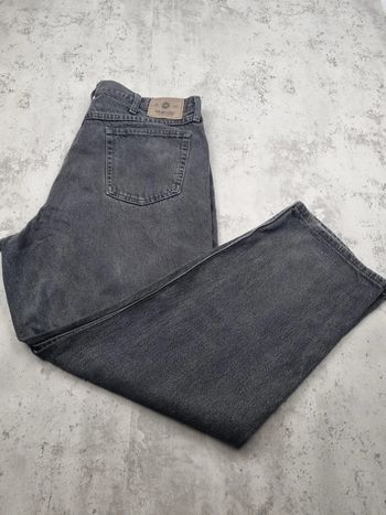 Jean Wrangler noir Taille 40x30 (mesures en photos)