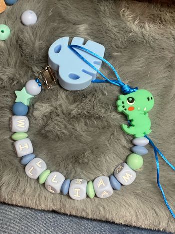 Attache tétine Dino