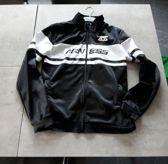 Veste T14 ans