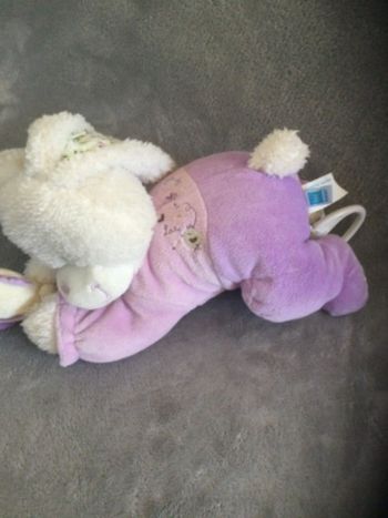 doudou lapin  boîte à musique tex baby tbe