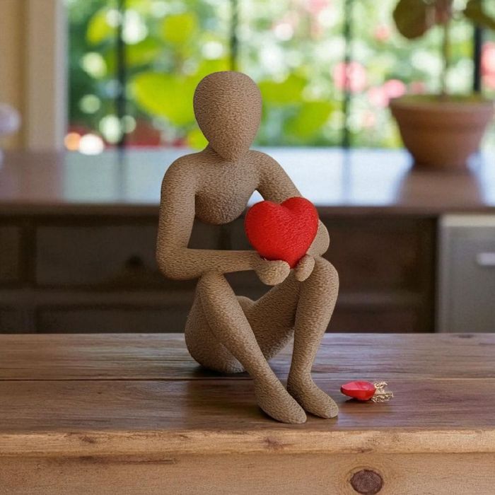 Statue décorative beige sable avec coeur rouge. - photo numéro 4