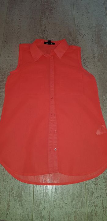 Haut sans manches orange néon