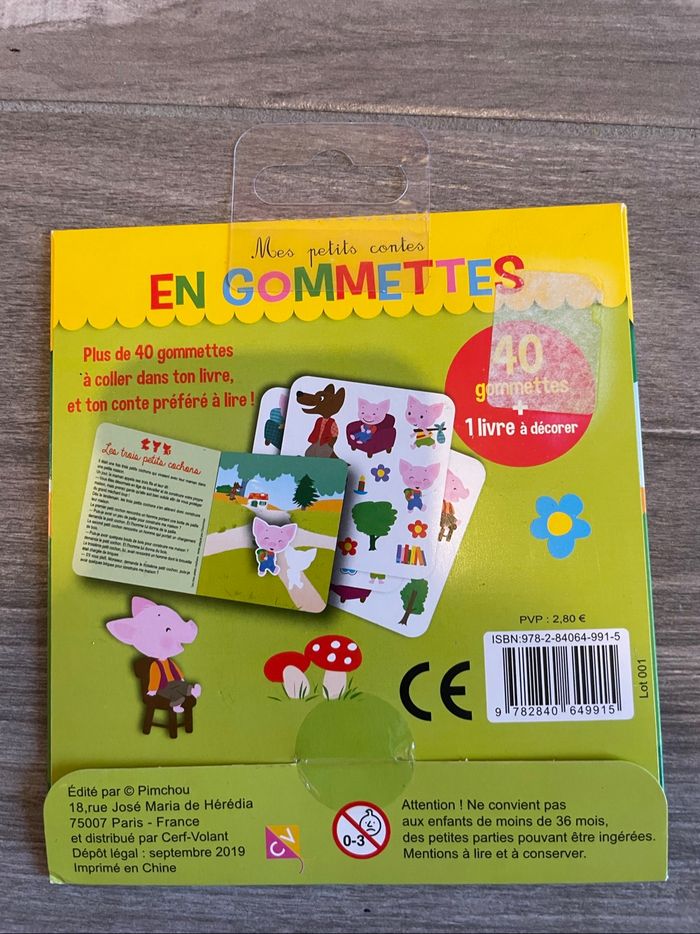 Livre et gommettes - photo numéro 2