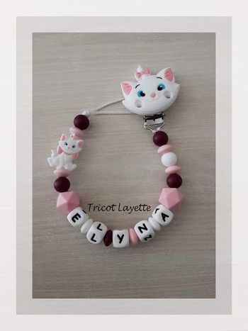 Attache tétine aristochat