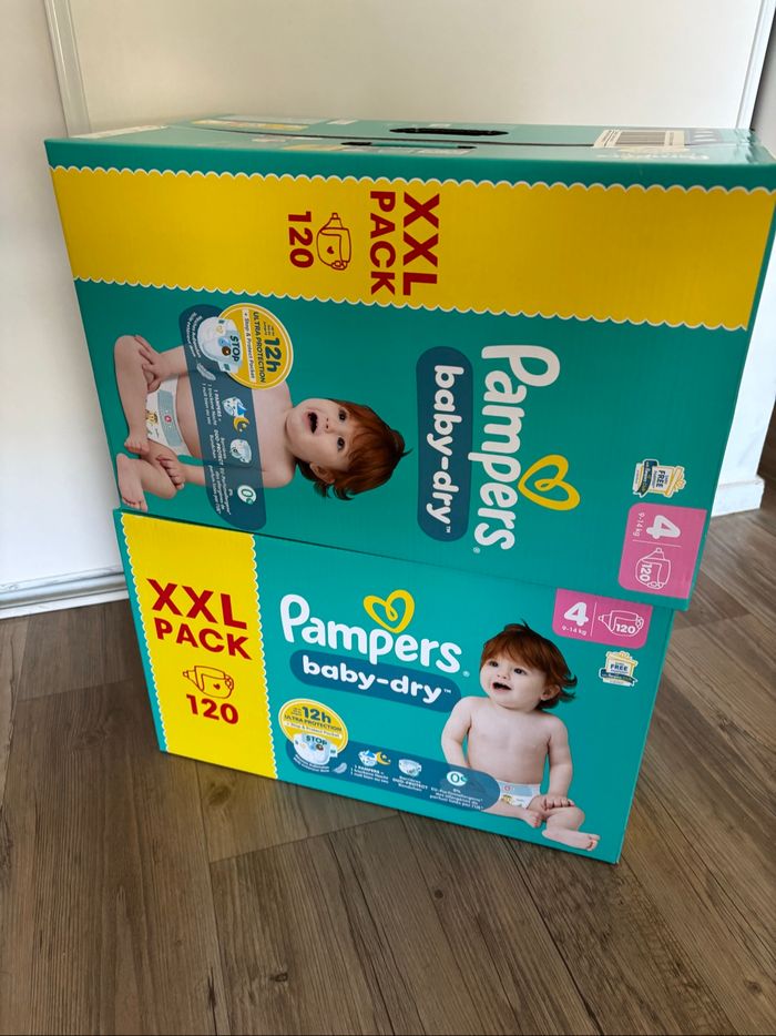 2 cartons de couches Pampers taille 4