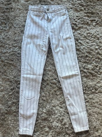 Jeans blanc à rayures noir