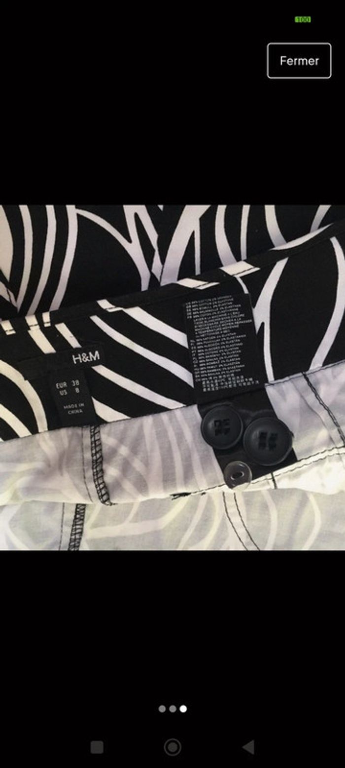Jupe trapèze noire et blanche h&m t38 motif feuilles - photo numéro 3