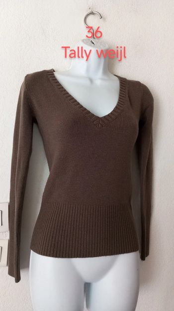 Pull moulant femme.36..