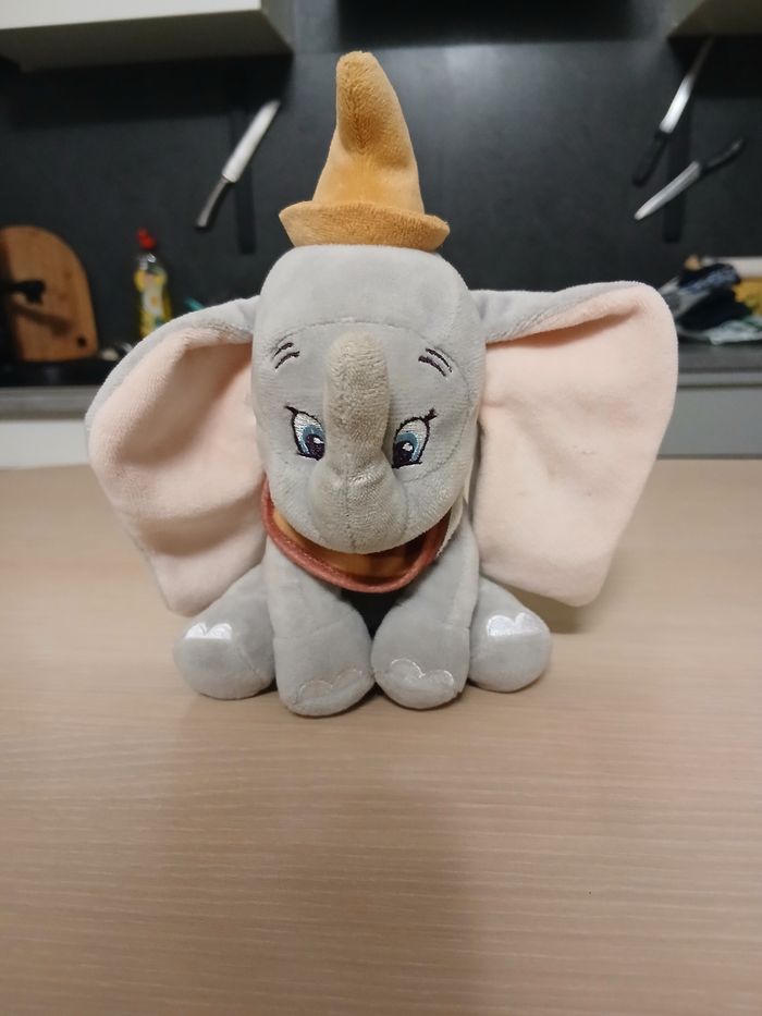 Peluche disney 12cm matiere polyster  couleur gris,rose,moutarde - photo numéro 2