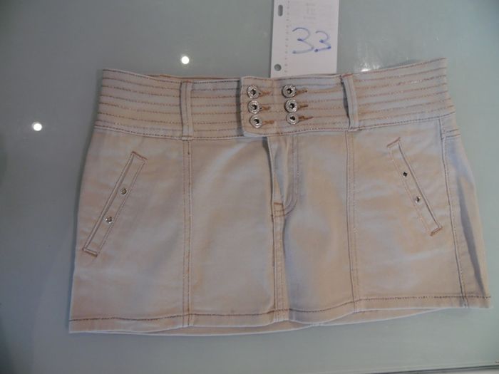 mini-jupe beige black et bat taille L 38 / 40