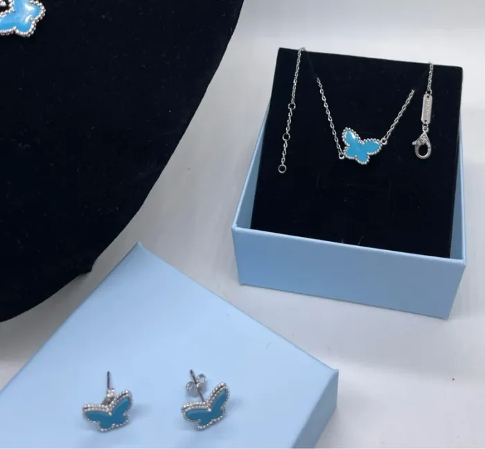Parure pour femme argenté motif papillon 🦋 - photo numéro 2