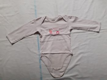 Body rose clair motif animaux roses