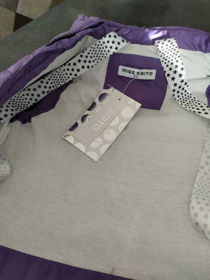 Joli doudoune sans manches pour bébé - photo numéro 3