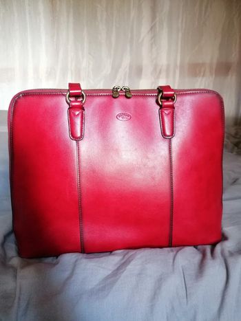 Sac vintage katana rouge cuir véritable.