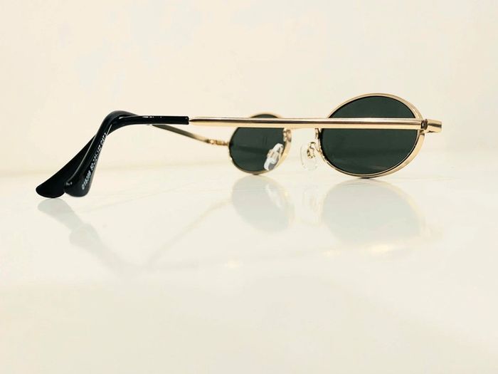 Lunette de soleil mixte ovale dorée verres verts uvprotection catégorie 3 taille moyenne - photo numéro 6