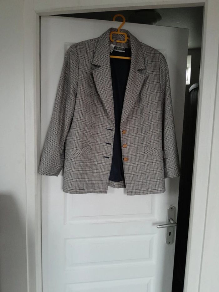 Très jolie veste karting peu être porté oversize