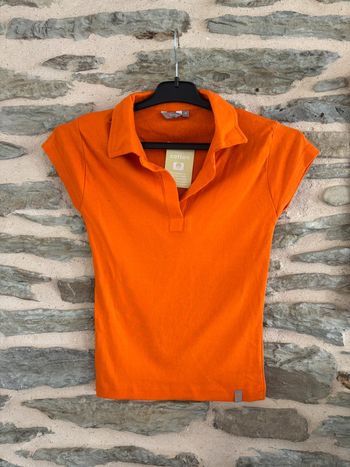Polo orange taille M neuf avec étiquette