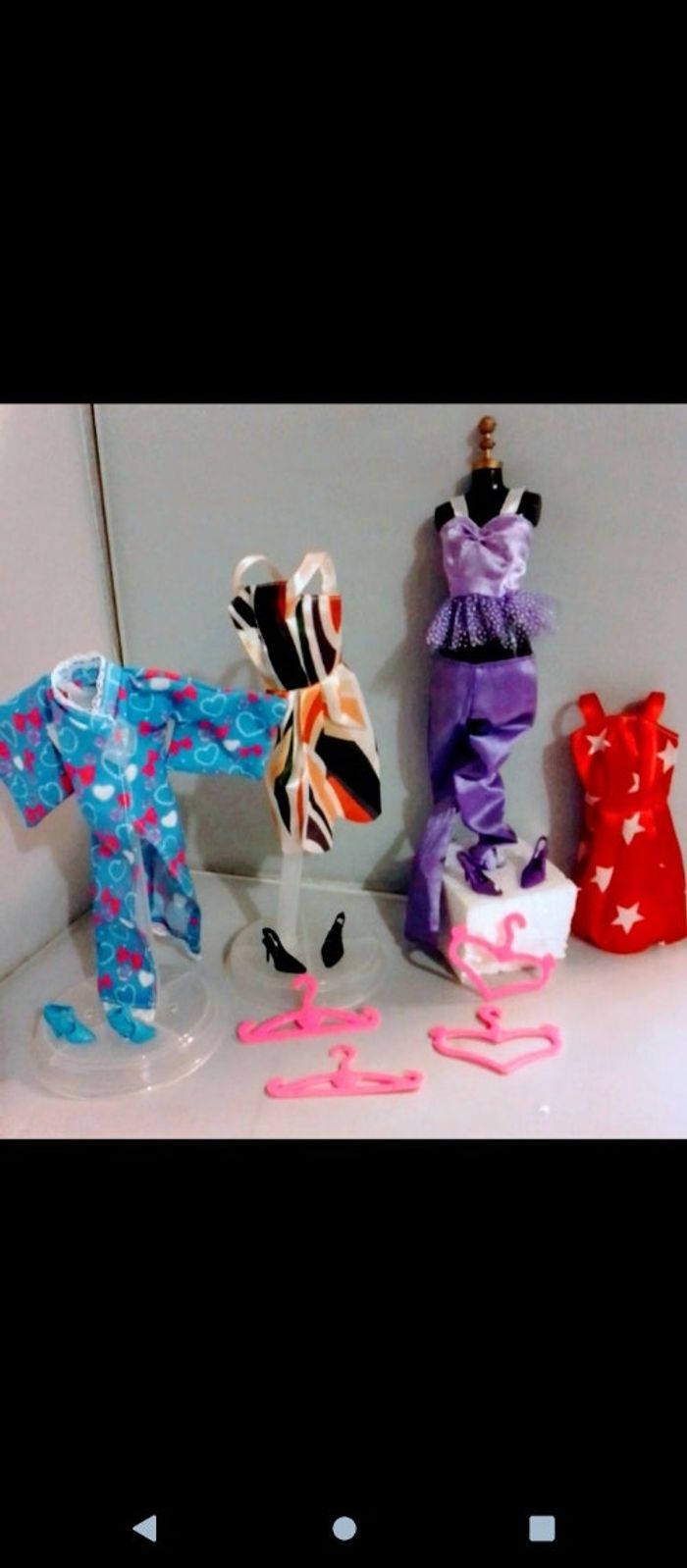 Lot de vêtements pour poupée