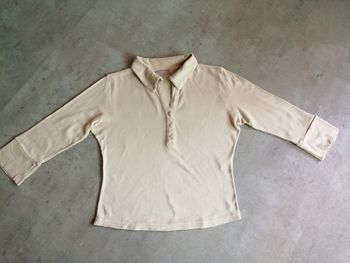 Top style polo beige Taille M Jennyfer