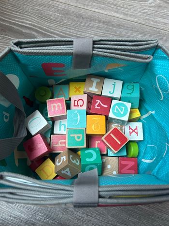 Sac de jeux convertible en tapis de jeux 