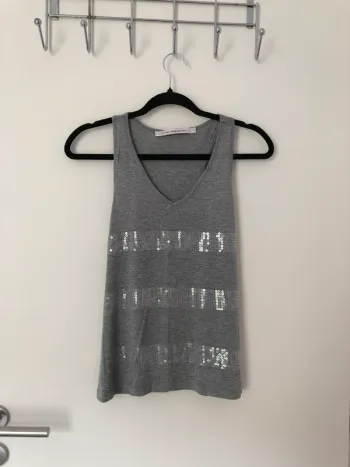 Débardeur gris à paillettes La Fée Maraboutée taille 1