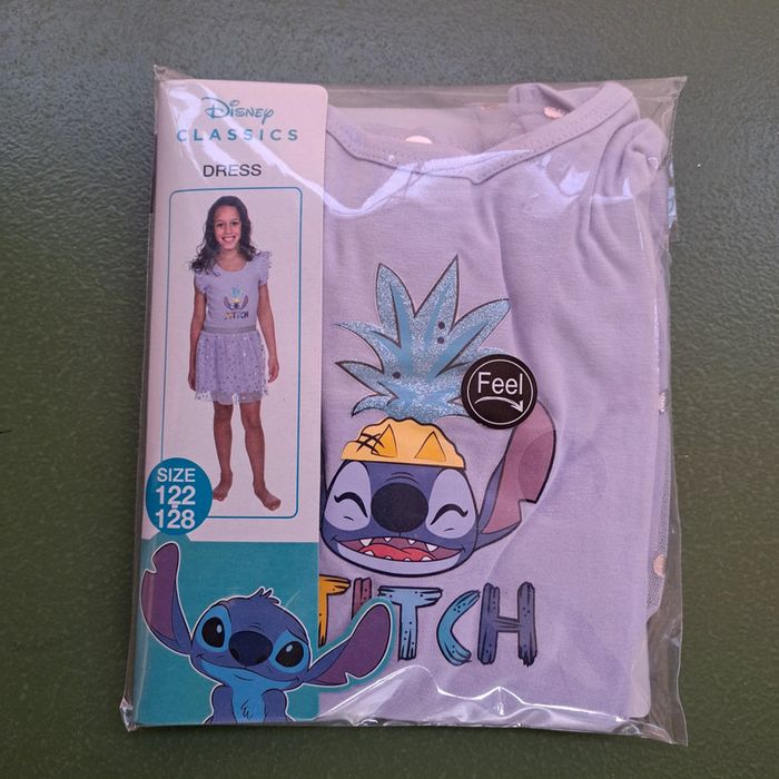 Robe stitch 122-128 neuve