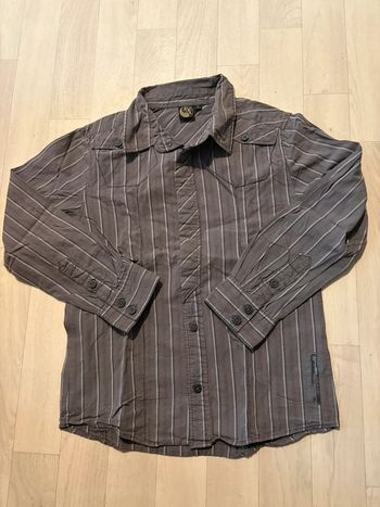 Chemise grise by kool 10 ans manches longues très bon état