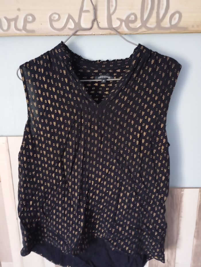 Blouse sans manches taille M