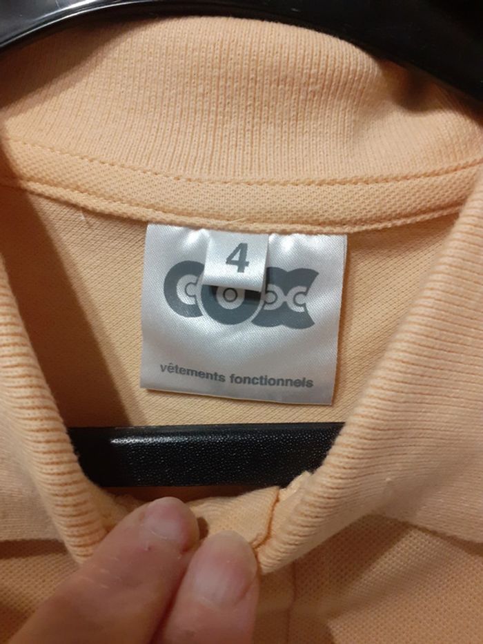 Polo  taille 4 neuf - photo numéro 2