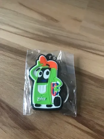 porte clé vert neuf toujours en sachet jamais utilisé