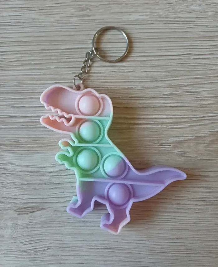 Porte clé Pop-it dinosaure