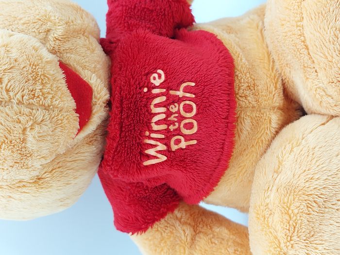 Peluche doudou Winnie l’ourson gros pieds DISNEY NICOTOY SIMBA 35 cm - photo numéro 2