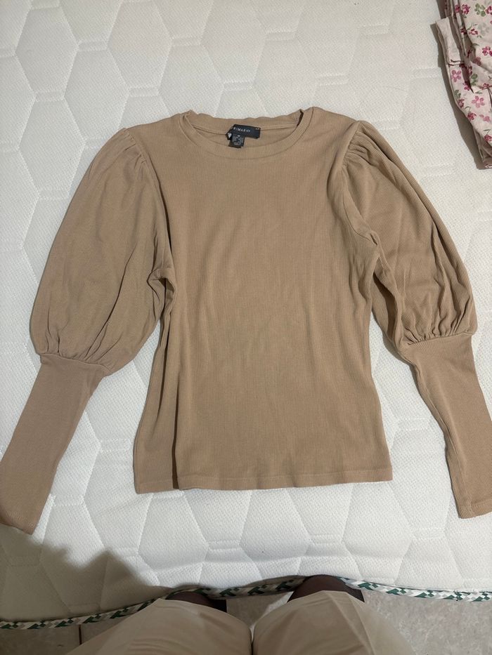 Hauts à manches bouffantes