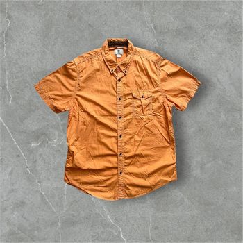 Chemise vintage Timberland . Taille L. Couleur orange. Très bon état