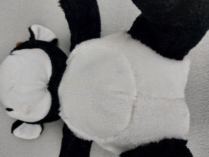 Peluche doudou vache blanc noir marron 23 cm assis yeux durs - photo numéro 3