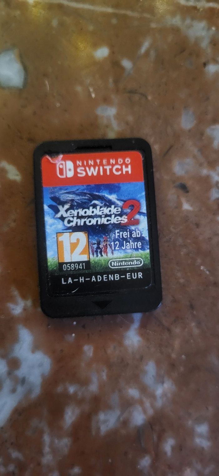 Console Nintendo Switch comme neuve + 1 jeu - photo numéro 4