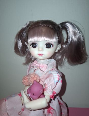 Poupée articulée rose